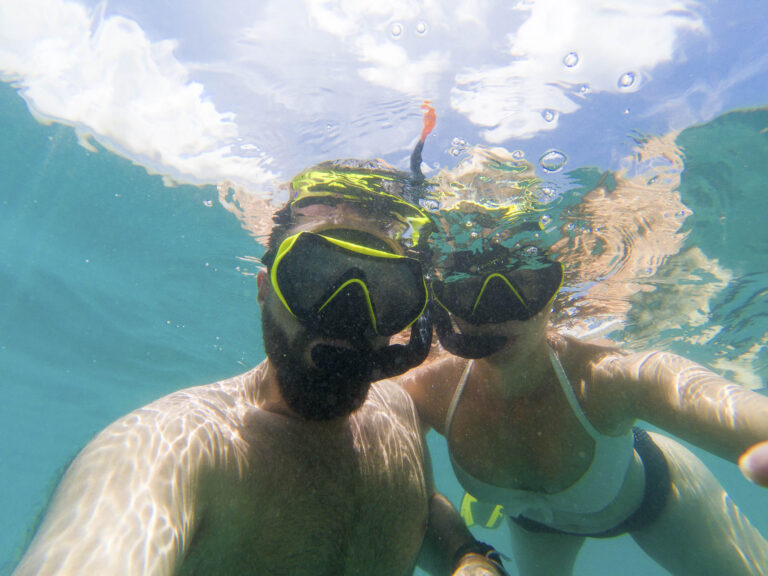 Caucasian couple snorkling on tourist tour on Phuket